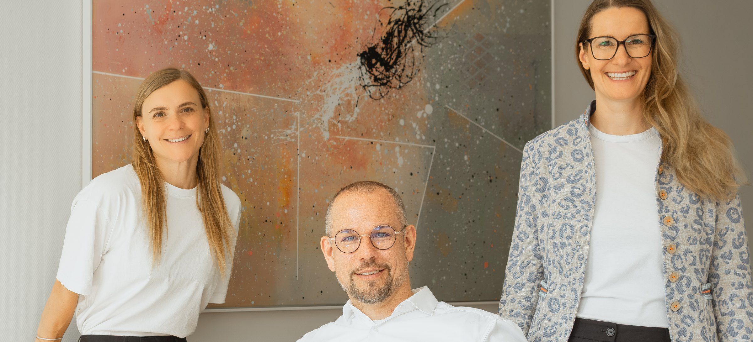 Jana Wolf, Andreas Lippke and Michaela Lippke in the office in Wolfsburg.